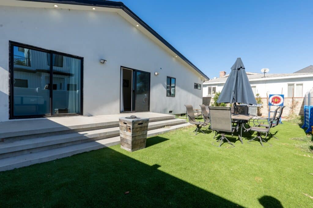 Finished ADU exterior and backyard patio — Cantaloupe Ave project, Van Nuys